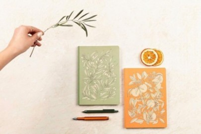 Clairefontaine Rhodia, A paperback notebook with orange blossoms and olive trees,  A5 14.8 x 21 cm, 160 pages lined white paper 90 g,  flexible brochure, canvas back  116344C