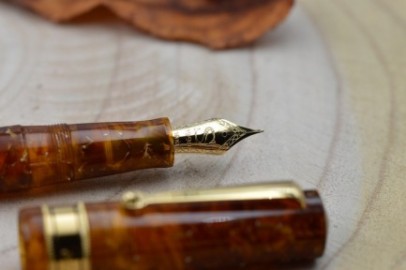 Santini Italia Libra Ambra GP 18k Superflexy Fine nib piston filler pen with ebonite feeder