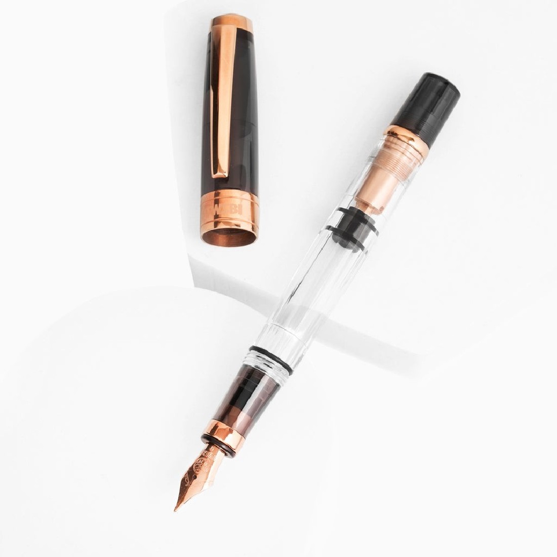 Twsbi Diamond 580 Smoke Rose Gold II piston filling Fountain pen